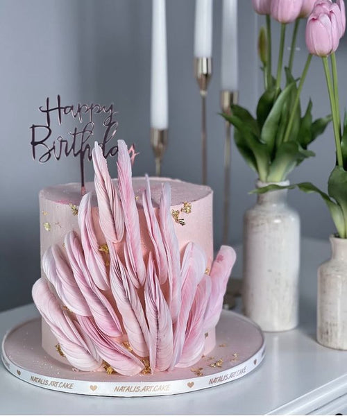 Pink birthday cake with sculpted petal wafers